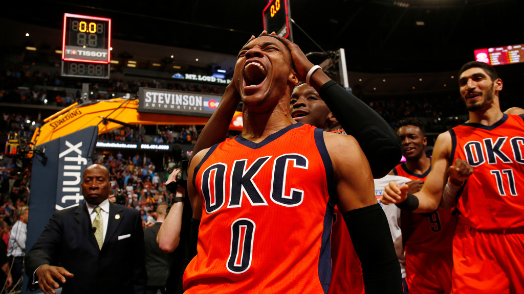 Oklahoma City Thunder guard Russell Westbrook celebrates after hitting a buzzer beater three point shot to win the game against the Denver Nuggets following a basketball game Sunday, April 9, 2017, in Denver. Oklahoma City beat Denver 106-105. Westbrook also broke the NBA record for triple doubles with 42. (AP Photo/Jack Dempsey)